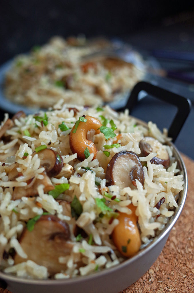 A bowl of mushroom and cashew nut pulao rice