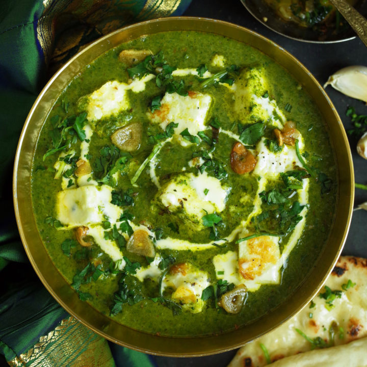Indian Palak Paneer topped with cream and coriander with Garlic and Coriander Naan bread