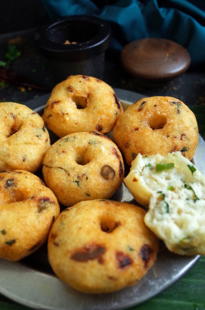 A stack of Medu Vada on a steel plate