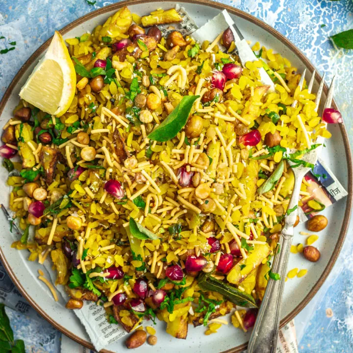 Maharashtrian kanda batata poha on a plate