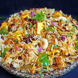 Vegetarian Paneer Biryani Rice on a metal tray