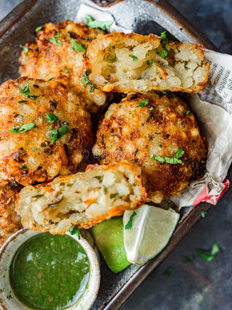 Vegan tapioca fritters on newspaper