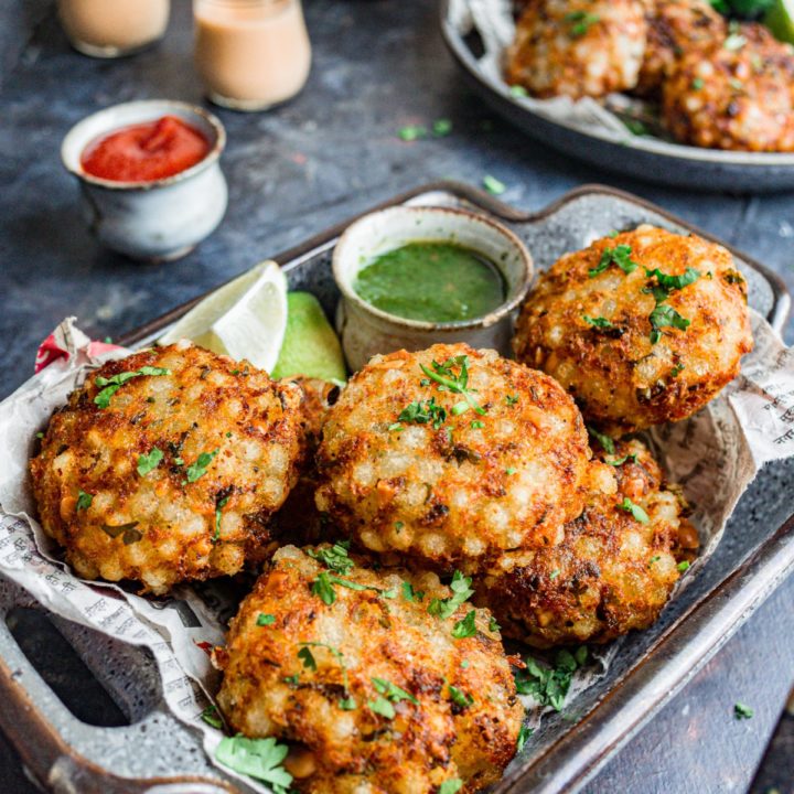 Sabudana vada with ketchup, green chutney, and masala chai