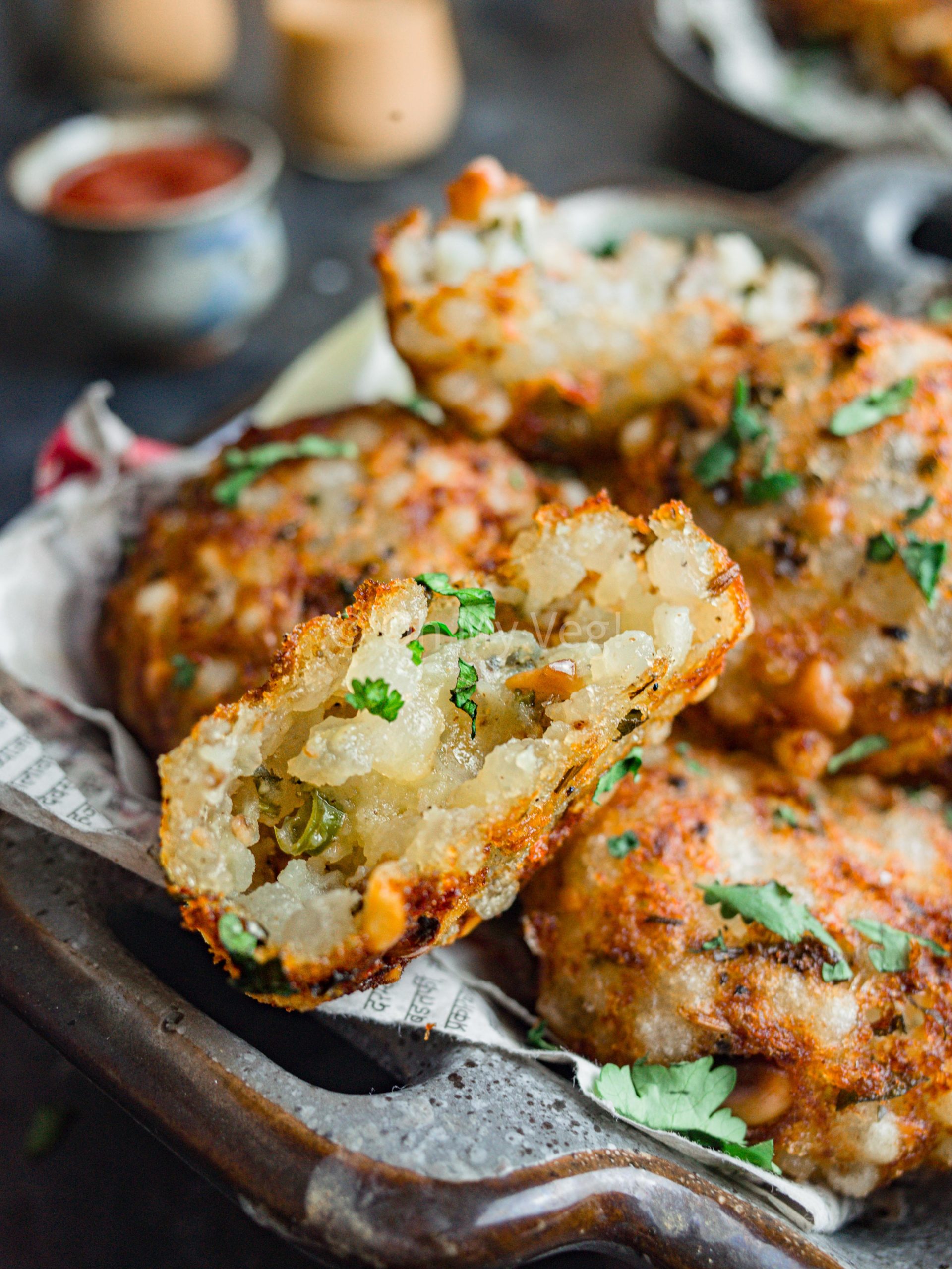 Halved tapioca fritters, showing the soft inside. 