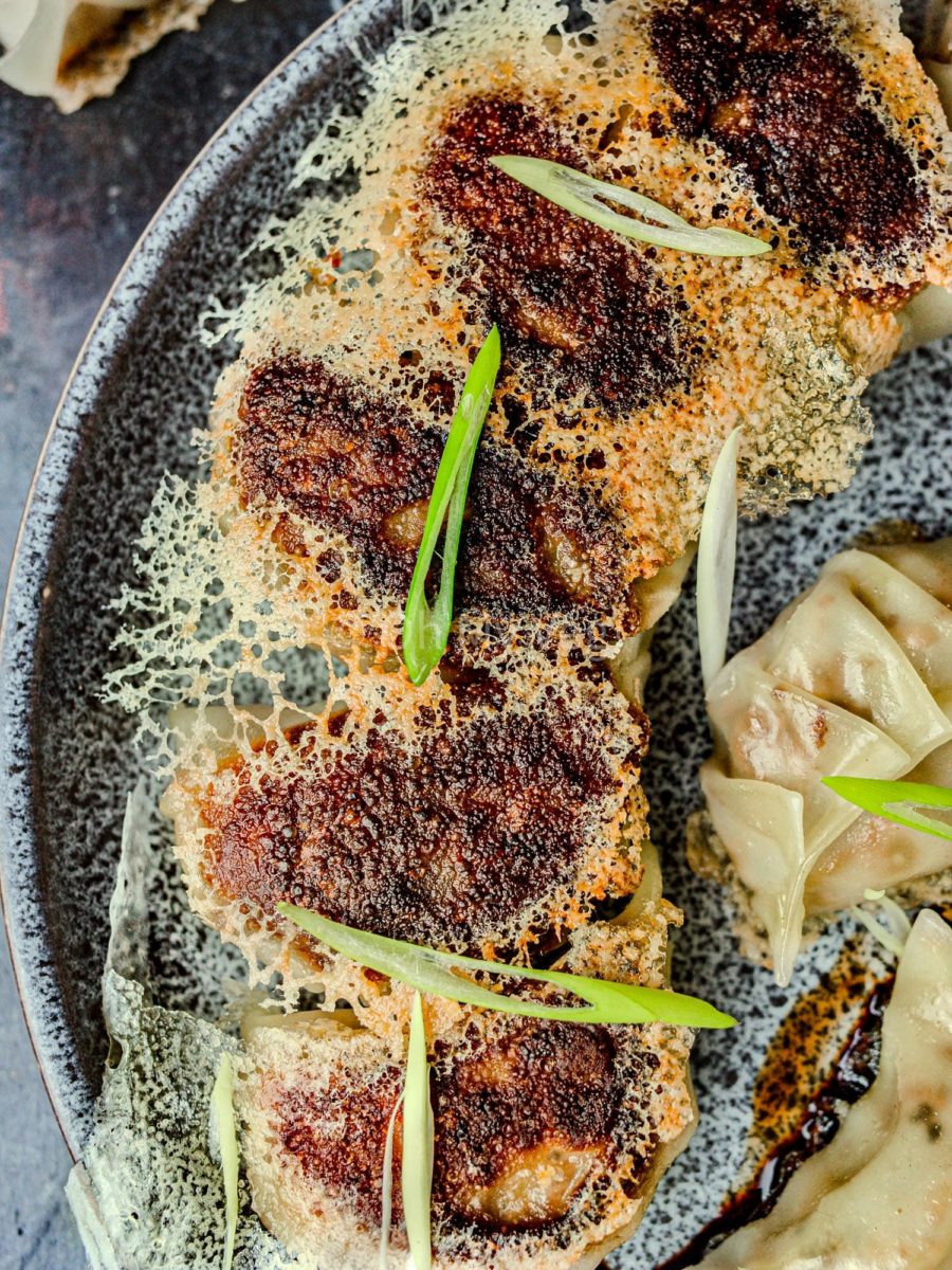 Crispy dumpling skirt on vegan potstickers. 