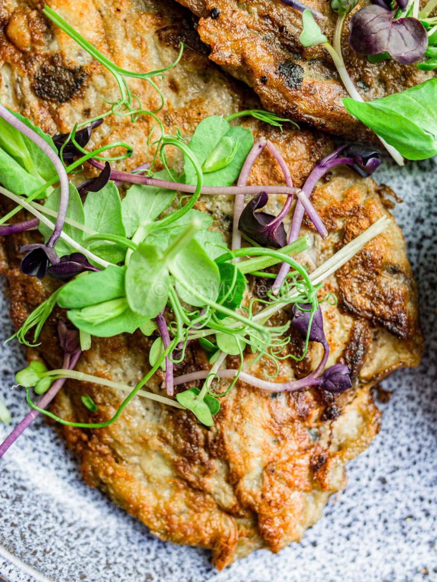 Close up of greens on Filipino tortang talong.