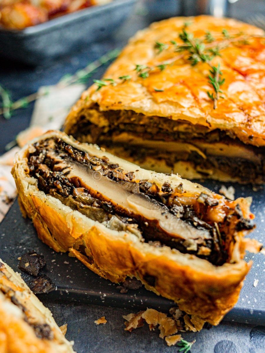 Close up photo of a slice of mushroom wellington.