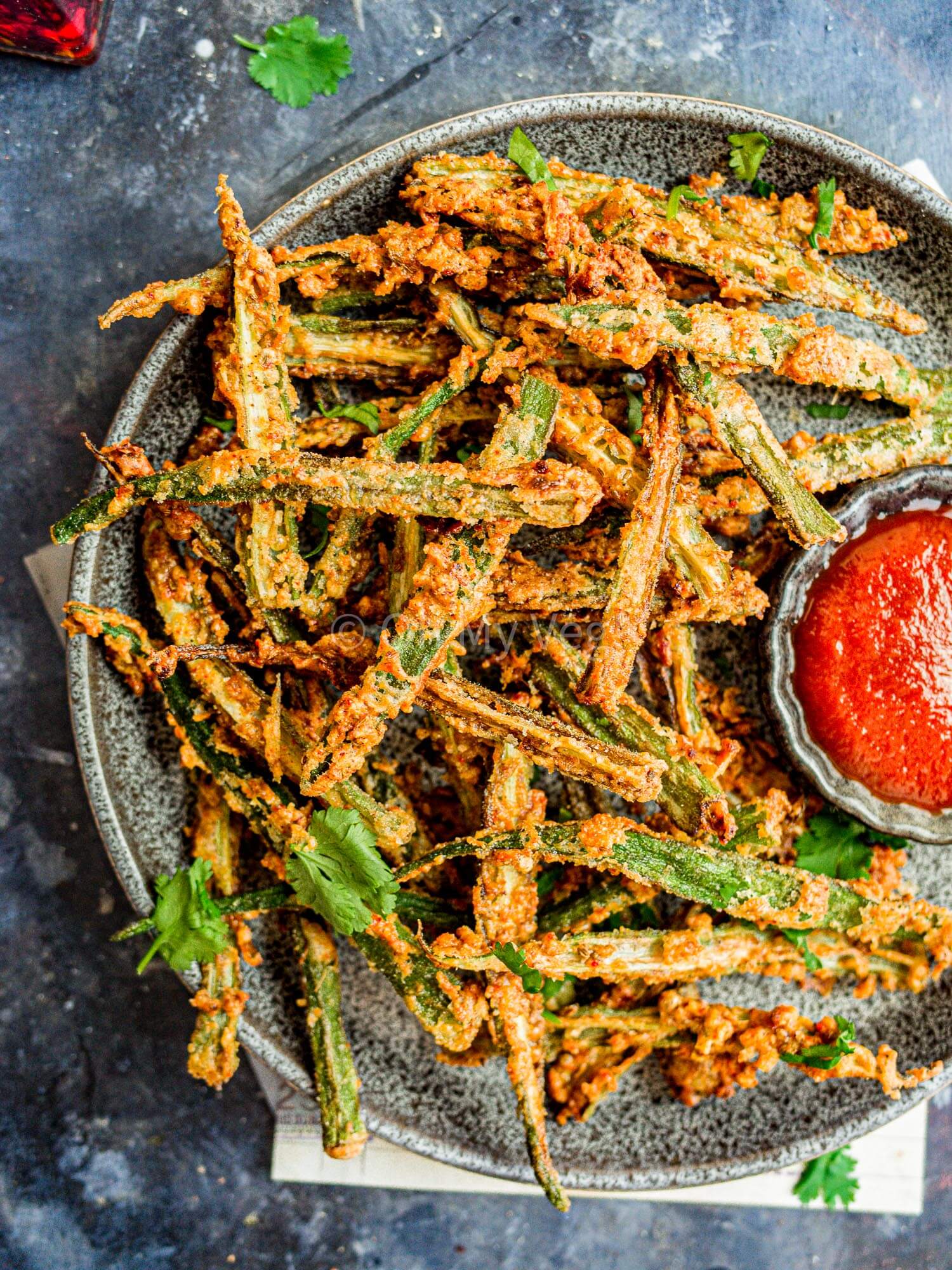 Crispy okra fries, Indian kurkuri bhindi, with ketchup.