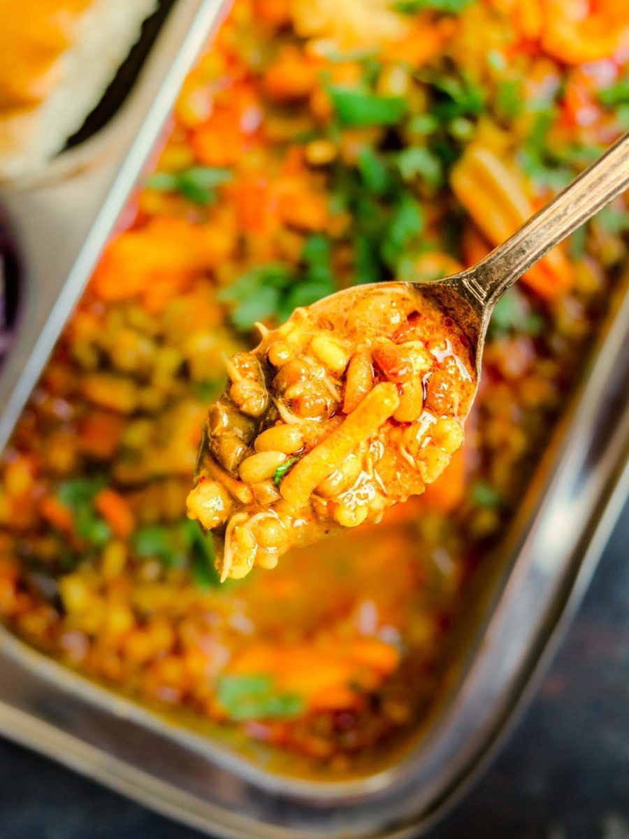 Marathi misal on a spoon.