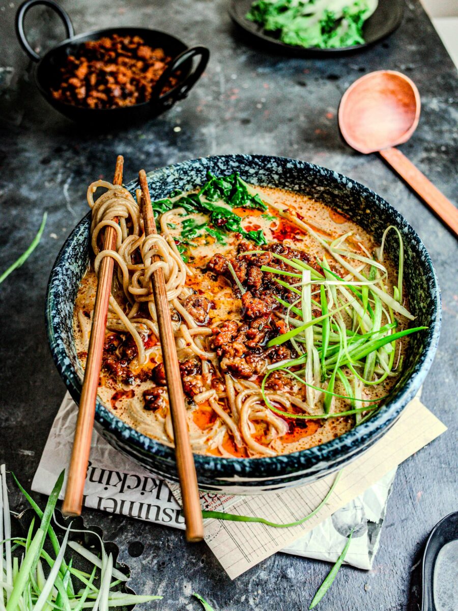 Vegan tantanmen ramen in a bowl with chopsticks. 