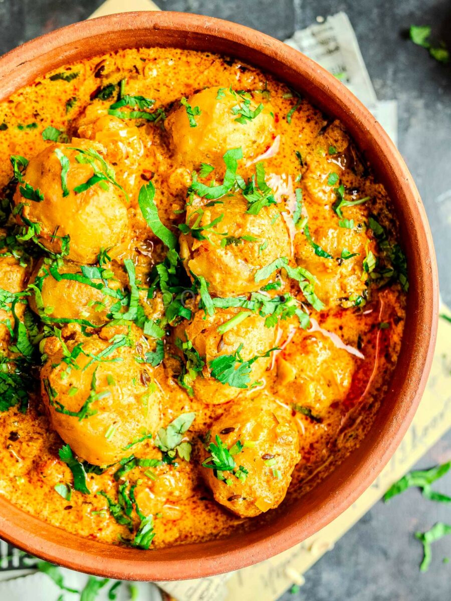 Punjabi dum aloo in a clay bowl.