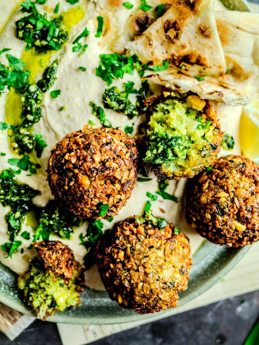 Close up of wild garlic falafel which are green inside. 