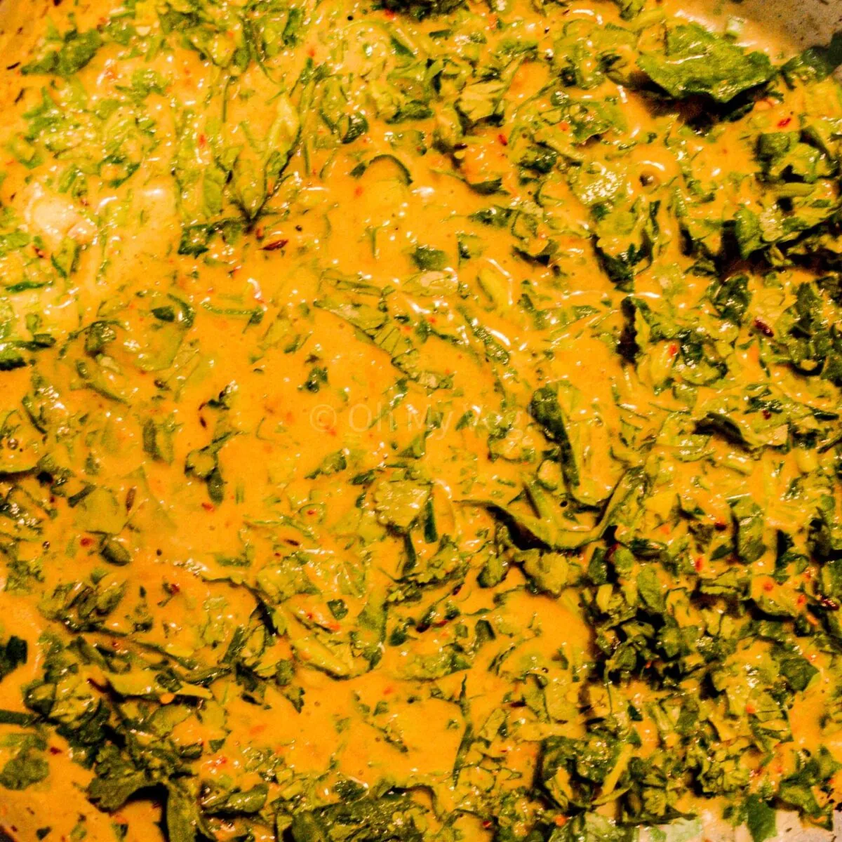 Kothimbir vadi batter in pan.