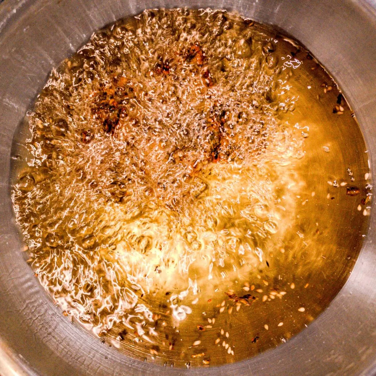 Kothimbir vadi frying.