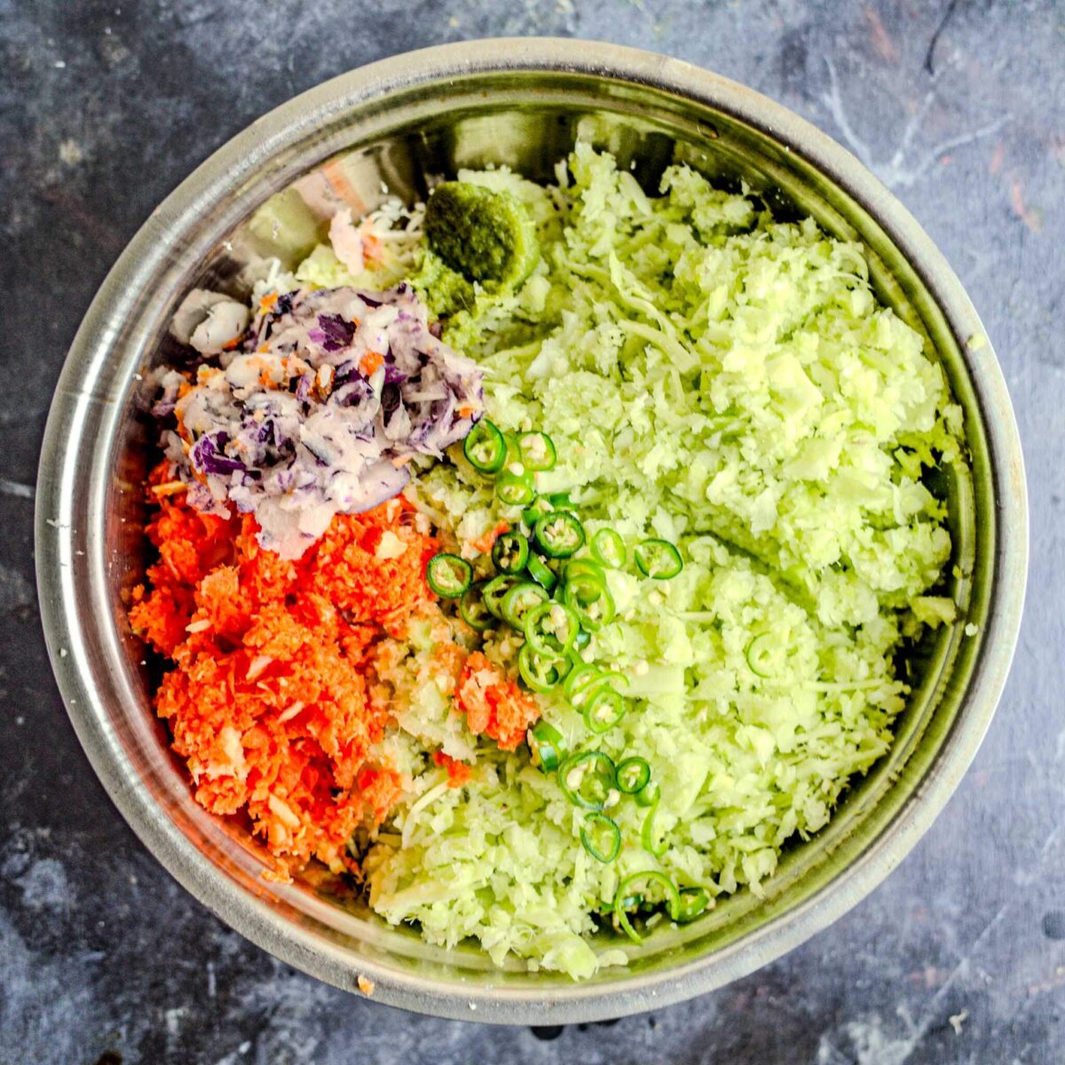 Grated vegetables in bowl.