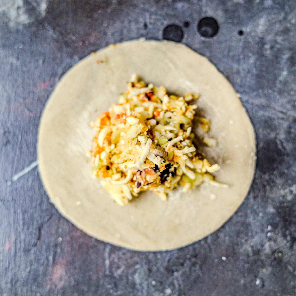 Paneer stuffing on momo wrapper.