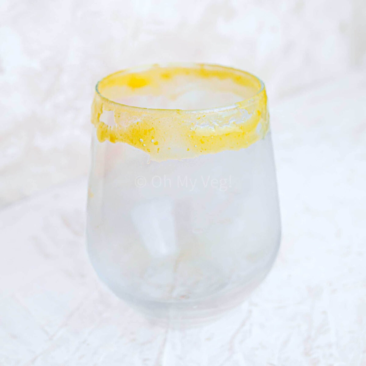 Peach puree on rim.