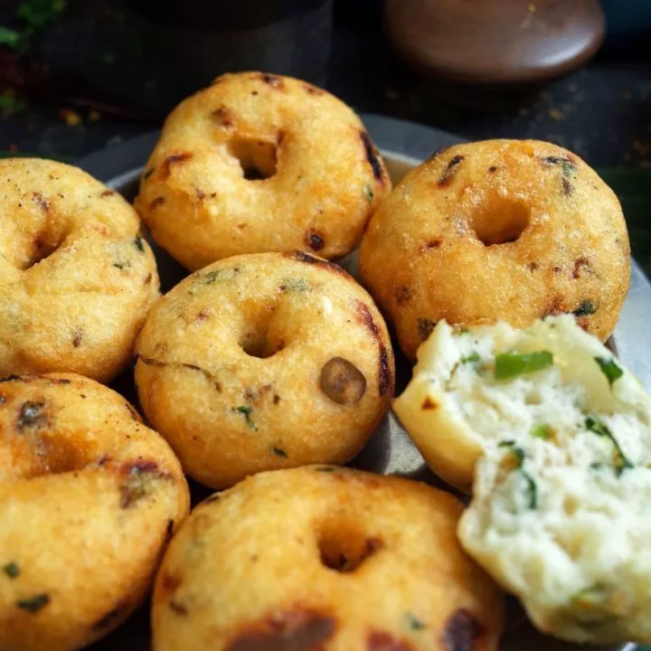 A stack of Medu Vada on a steel plate