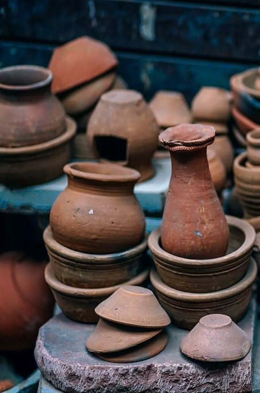 A collection of rustic clay pots
