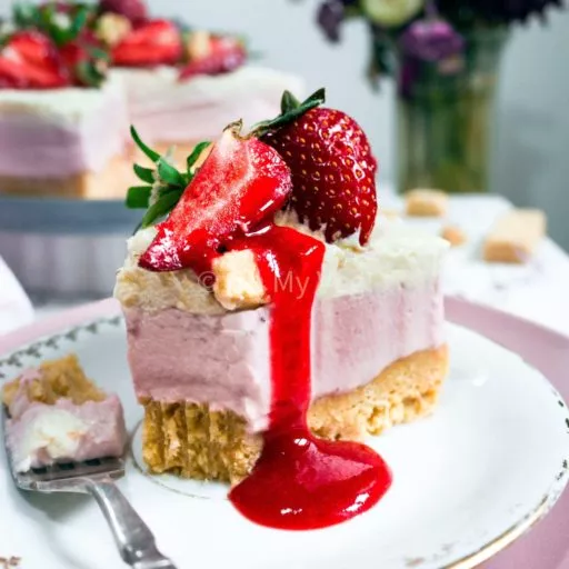 Strawberry cheesecake with strawberry sauce and fresh strawberries