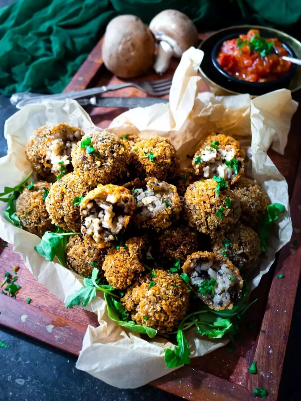 Vegan mushroom arancini in a pile.