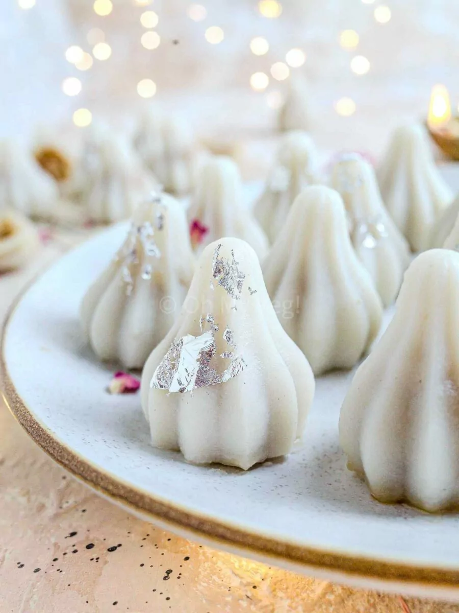 Ukadiche modak on a white plate.