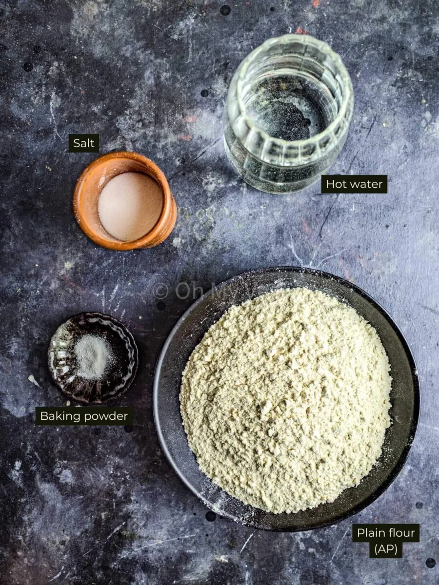 Ingredients for homemade momo wrappers, labeled with text. 