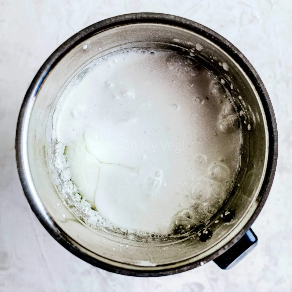 Coconut milk, flour, salt, eggs, and sugar in a blender.