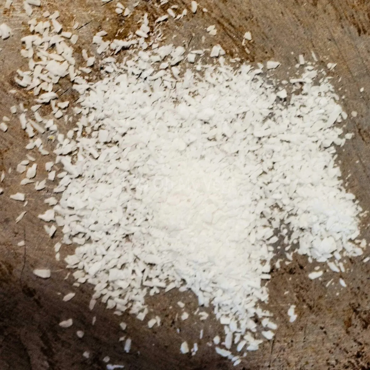 Desiccated coconut in a pan.