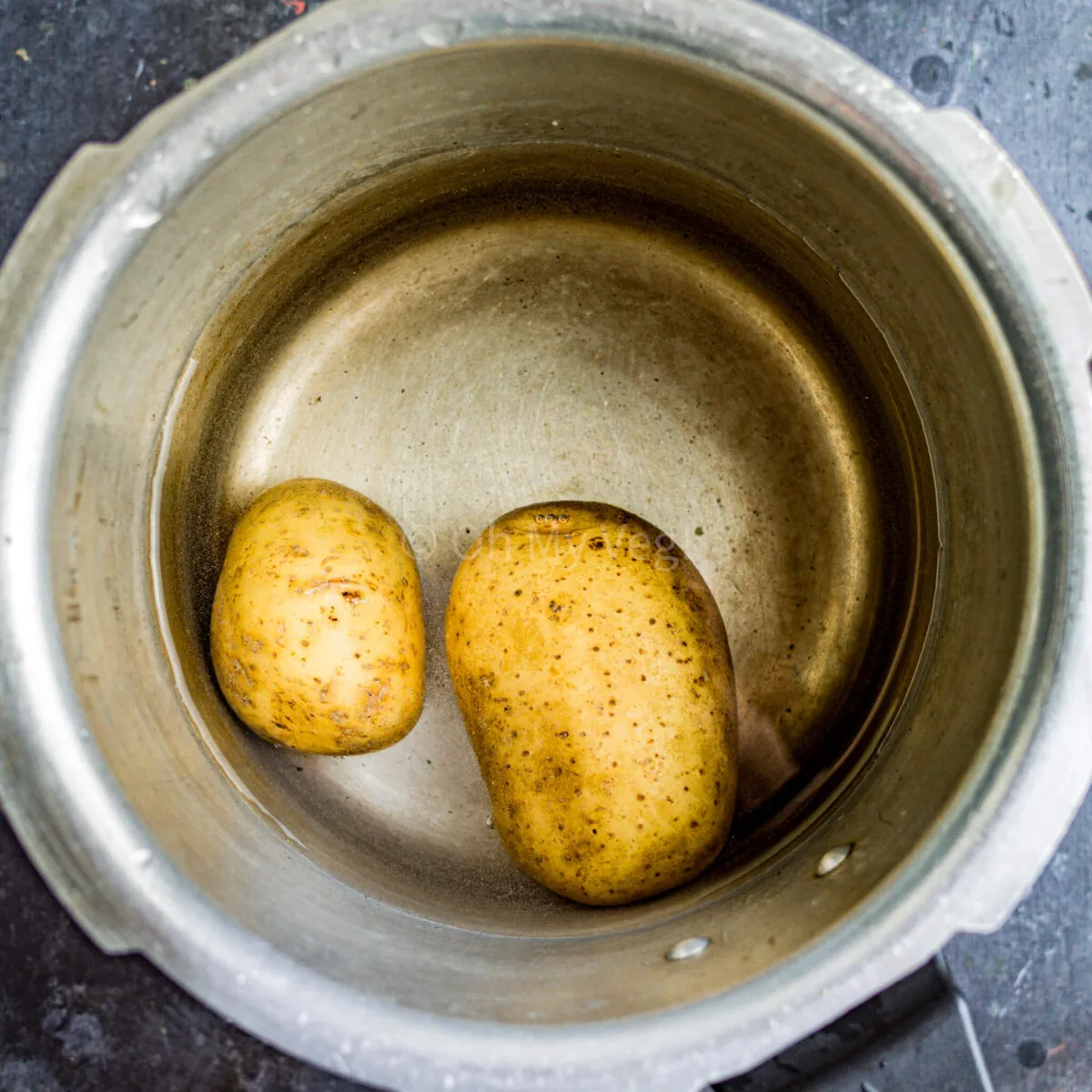 Potatoes in a pressure cooker.