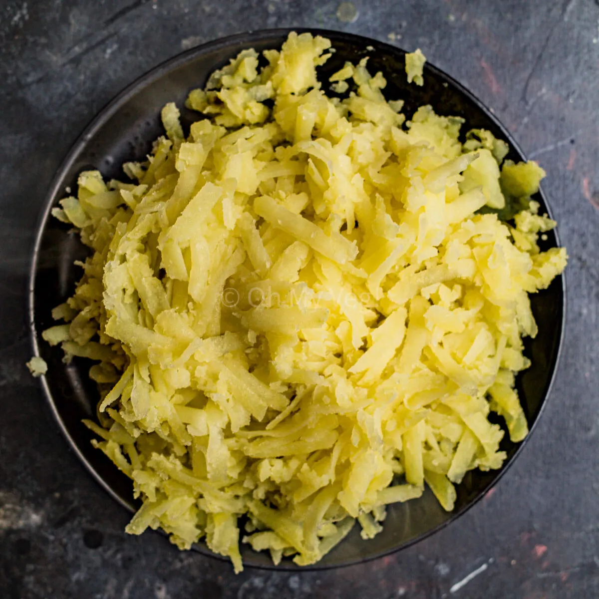 Grated cooked potato.