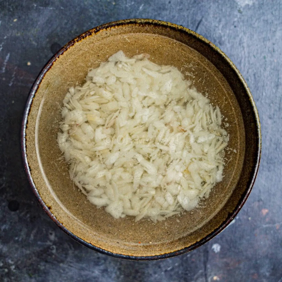 Poha soaking in water.